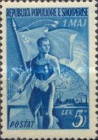 Bricklayer, flag, globe and “Industry”