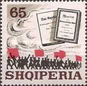 “Das Kapital,” “Communist Manifesto” and marching crowd