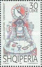 Old man seated at table