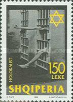 Holocaust, Arm and Feet through a gate