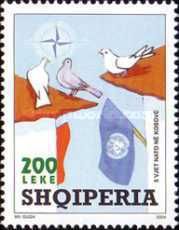 ‭NATO emblem, Doves, and UN flag