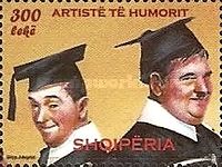 Laurel and Hardy Wearing Mortarboards