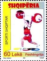 Weight Lifter and Olympic Rings