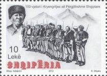 Rebel leader, row of insurgents