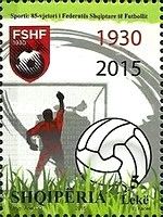 Federation emblem, football, goaltender and net
