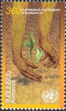 Hands Enclosing Seedling