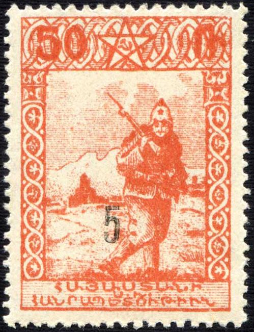 Red Army Soldier in Budenovka with a Rifle