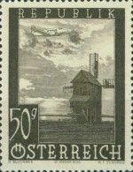 Airplane over windmill in St. Andrä (Burgenland)