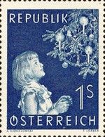 Girl with decorated christmas tree