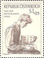 Young man with stamp album