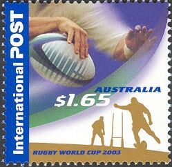 Hand Grasping Ball and Player Taking Shot at Goal