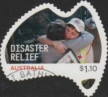 Aid Worker Comforting Victim