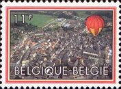 Red and Yellow Hot Air Balloon and Urban Site