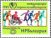 Wheelchair User between Runners