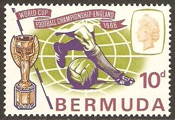Footballer's legs, ball and Jules Rimet Cup