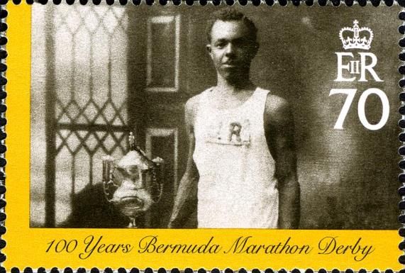 Athlete with trophy, window at left