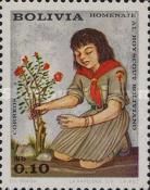 Girl-scout planting shrub