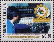 Pupils, bottling plant, school emblem