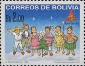 Children behind Christmas Tree