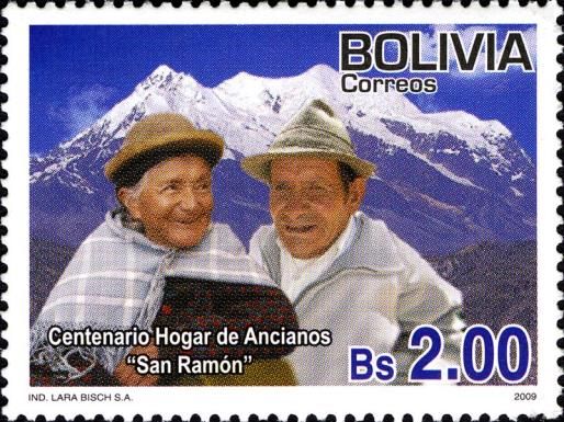 Elderly Couple and Snow-covered Mountains