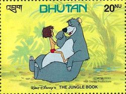 Mowgli and Baloo in the jungle