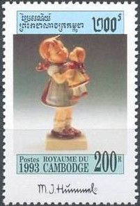 Girl holding doll