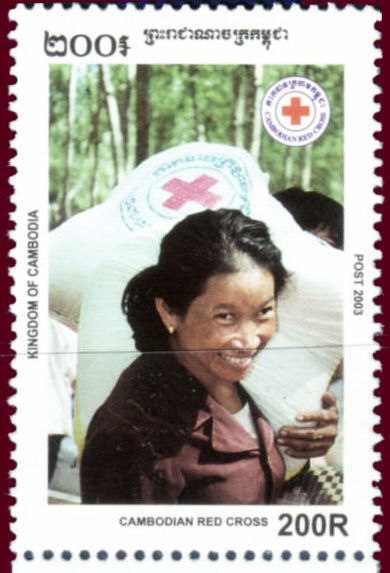 Woman carrying rice bag