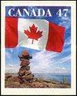 Canadian Flag and Inuit Cairn