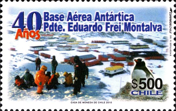 People and Gentoo Penguin; Base in background