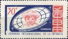 Boy in front of globe