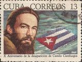 C. Cienfuegos, revolutionary; Cuban flag on the water