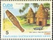 Tabaco idol and typical aboriginal houses (Cuba)