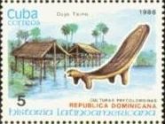 Typical houses and animal shaped seat (Dominica)