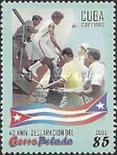 Men assisting woman down ship’s stairs