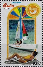 Sail Boat and Sunbathing on Beach
