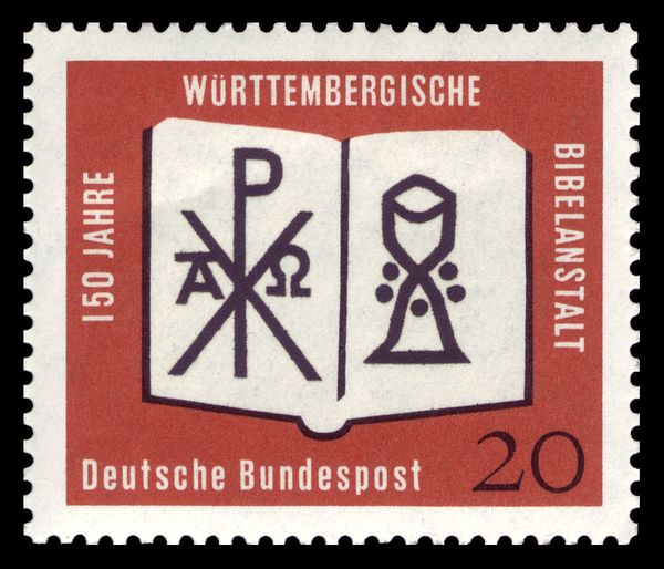 Open Bible with the monogram of Christ and goblet