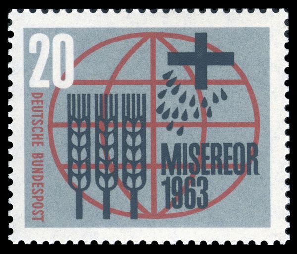 Stylized ears of corn, seeds, cross and inscription