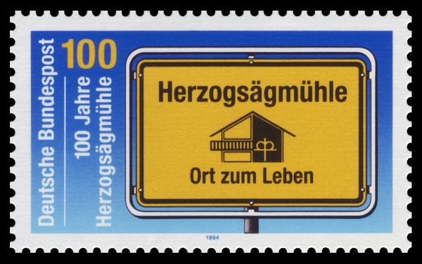 Village sign showing Society Emblem