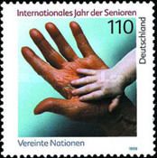 Hands of Elderly Person and Child