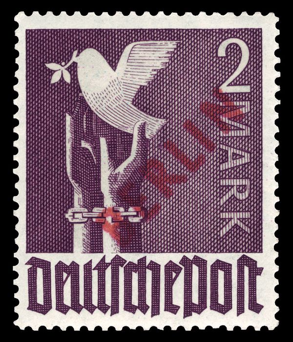 Peace dove over unfettered hands