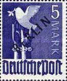 Peace dove over unfettered hands