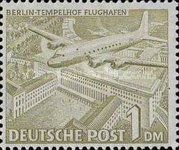 Airplane Douglas DC-4 over Tempelhof airport