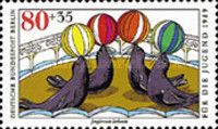 Sea-lions balancing balls