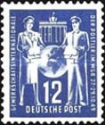 Brandenburg Gate, Berlin; Globe between postwoman and postma