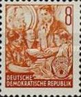 Students with picture of Karl Marx in the background