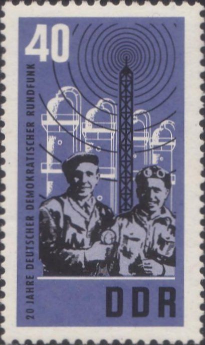 Workers with microphone, transmitter mast, chemical plant
