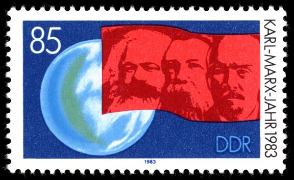 Globe and Banner Portraying Marx, Engels and Lenin