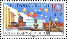 Building, balloons, doves