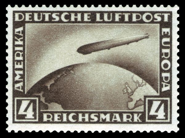 Airship "Graf Zeppelin L.Z. 127" over globe