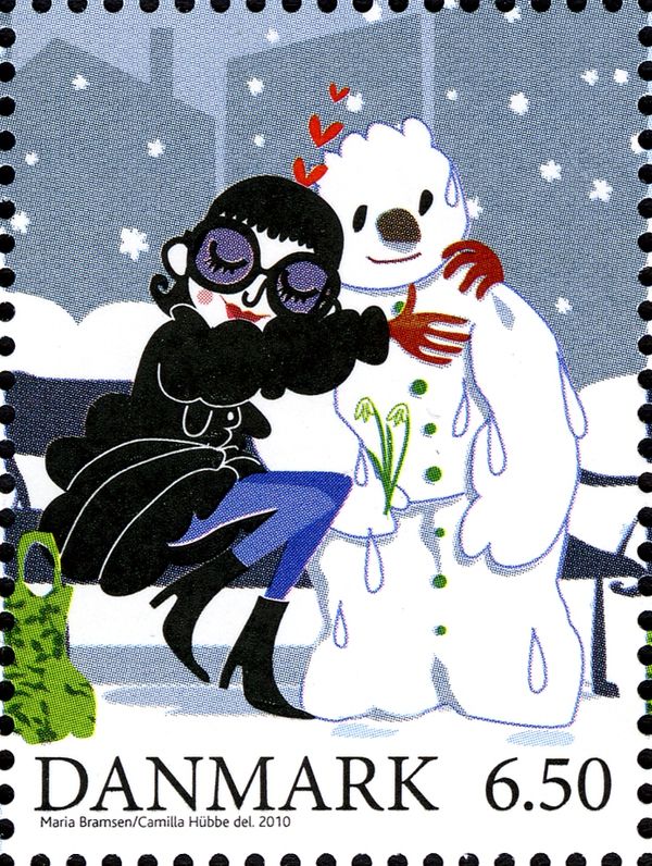 Woman embrace a snowman